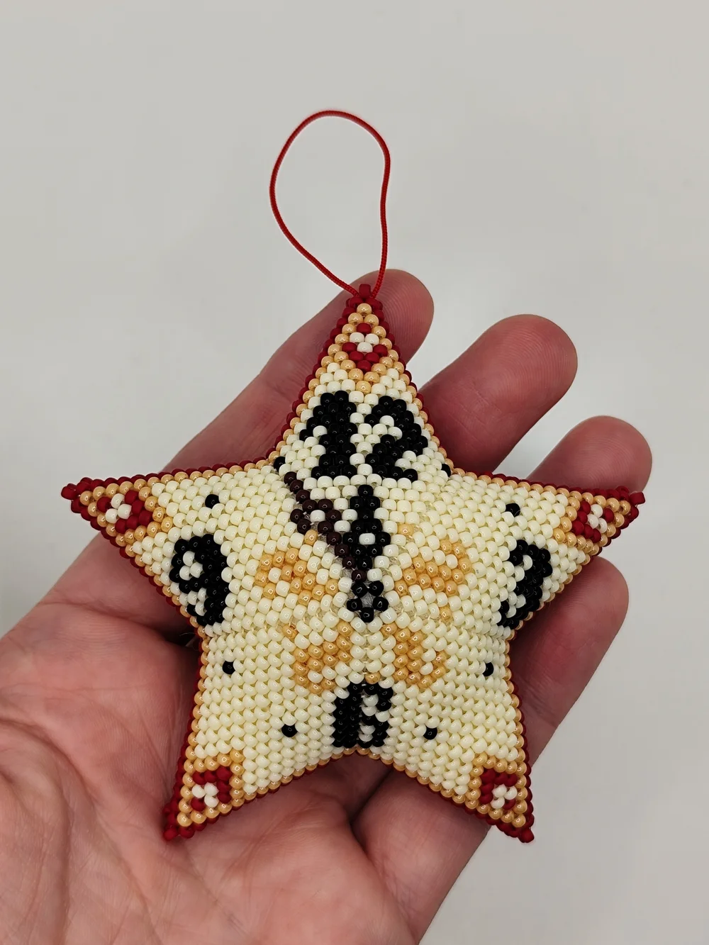 Handcrafted Star Ornament in Cream and Burgundy